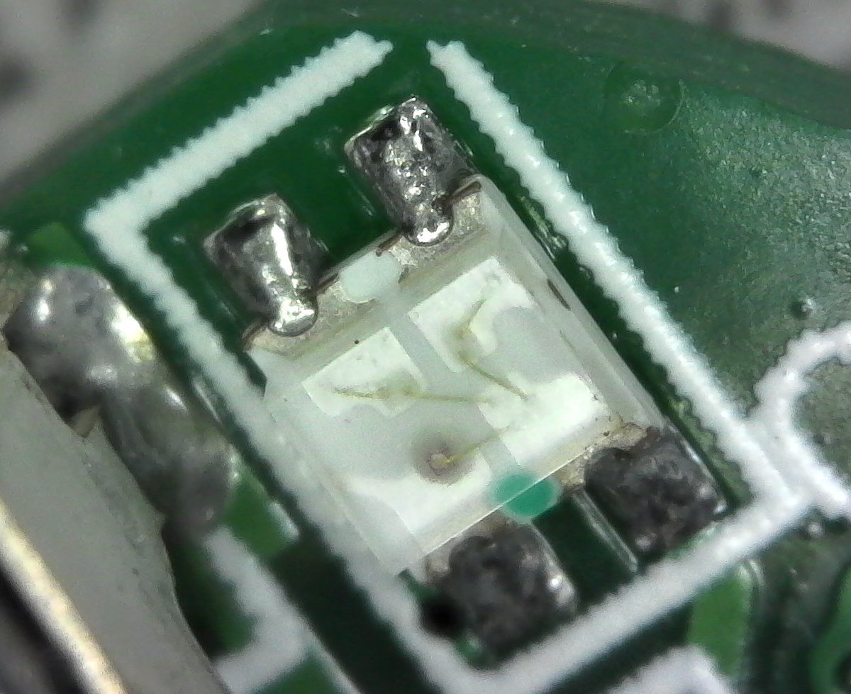 This here is a multi-color LED.I like how you can see the tiny wires between the contacts. I think this is two colors?