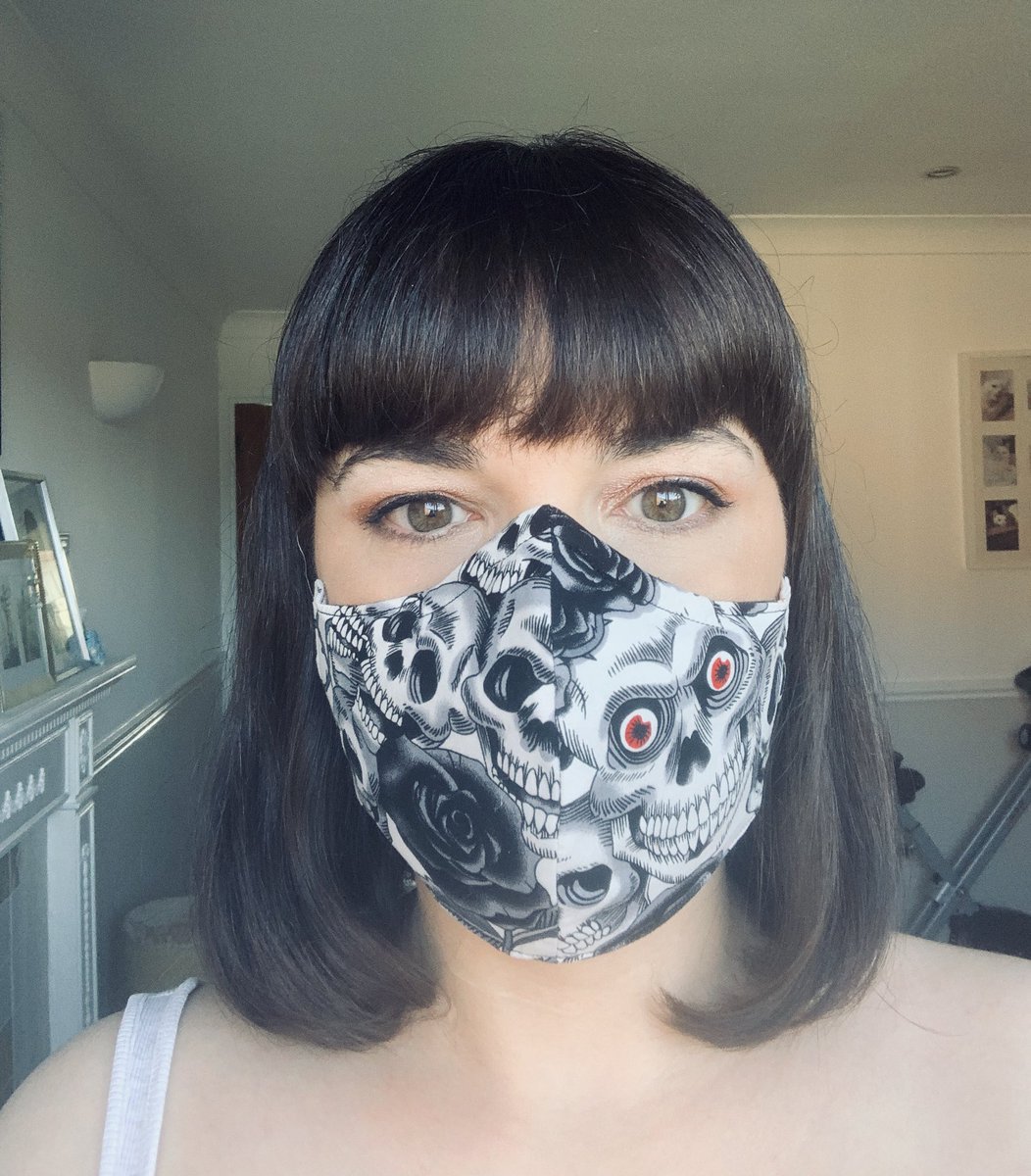 Laneylaneh's tweet photo. I am SO pleased with the mask that @SamJ_Clarke made for me. It fits beautifully! And she has put a lining inside so you can put in disposable filters. Such a clever lady! 💀 😀❤️🖤 https://t.co/udgptmMkD1