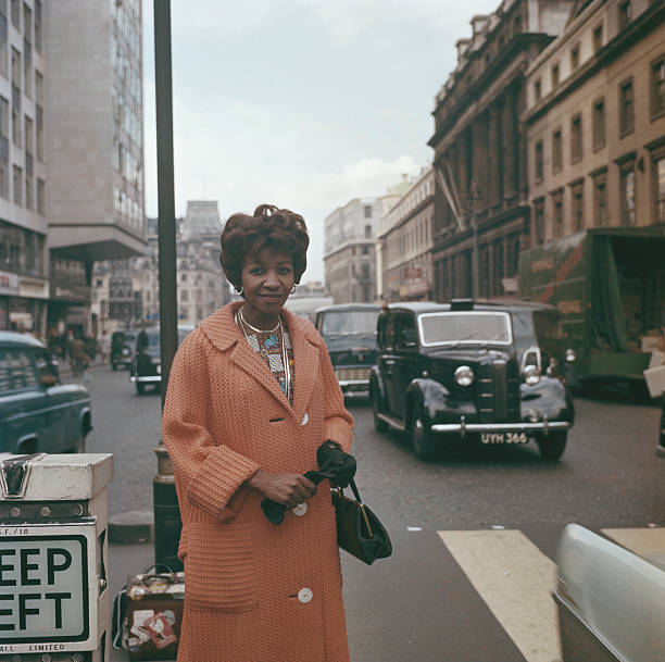 In the 70s Noni Jabavu also became a columnist for the Daily Dispatch. Here's another photograph of her in London, taken on 12 September 1961 outside the New Strand offices from the Rolls Press archive. The image in the first tweet is from the Keystone archive.