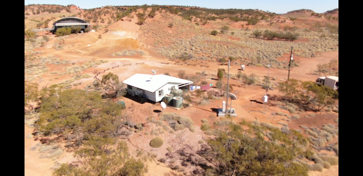 cdh348's tweet photo. The view from my office window today @Telstra NW Construction, while installing a Satellite Mobile Small Cell at Lark Quarry Dinosaur Tracks 110klm south of Winton Central QLD 100 million years in the making #dinosaurStampede #outbackqueensland  #dinosaur #mobilephone #satellite https://t.co/njBQfCF8M3