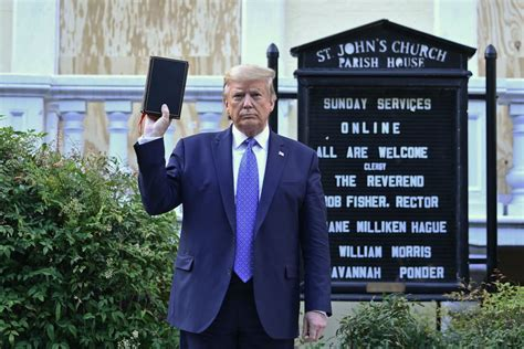 ...church. Holds up a Bible in defiance of the anti-Christs & treasonous seditionists etc., MSM & Ds accuse him of using an event for political purposes. Drunken Hag, not to be outdone, does her own photo shoot the next day.