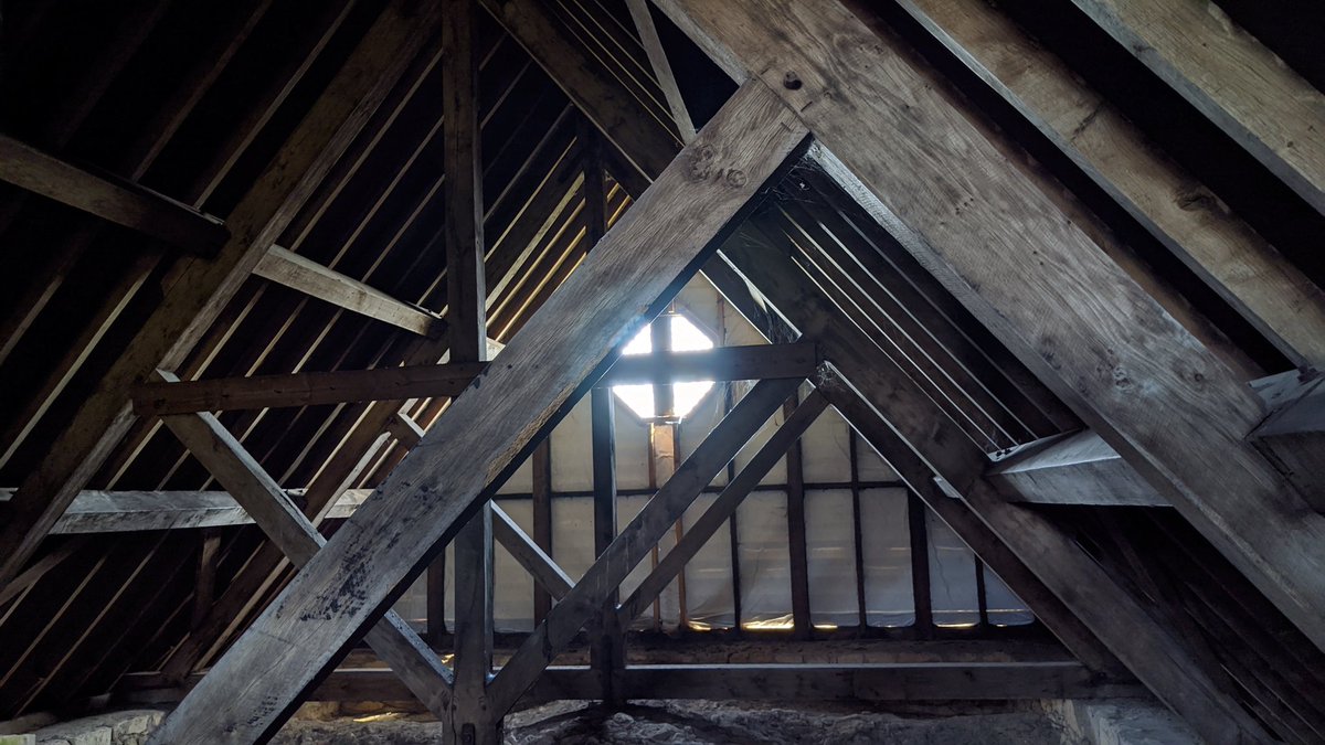 At the top of the staircase? The underside of the slightly bizarre modern roof, which is perched awkwardly on top of the medieval church, with gaps all along the edge, as if it's too scared to touch the stone.But more importantly, there's also the top of the vaulted ceiling!