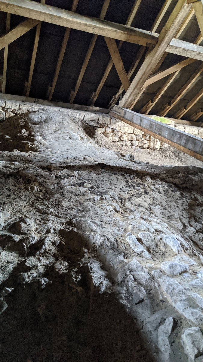 At the top of the staircase? The underside of the slightly bizarre modern roof, which is perched awkwardly on top of the medieval church, with gaps all along the edge, as if it's too scared to touch the stone.But more importantly, there's also the top of the vaulted ceiling!