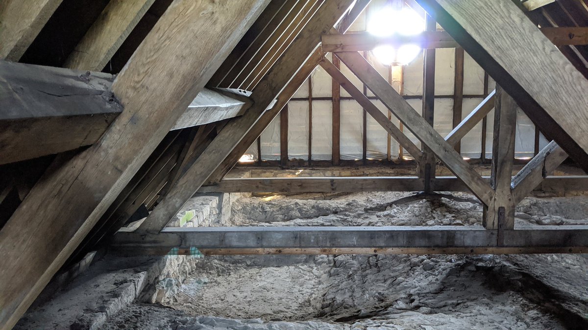 At the top of the staircase? The underside of the slightly bizarre modern roof, which is perched awkwardly on top of the medieval church, with gaps all along the edge, as if it's too scared to touch the stone.But more importantly, there's also the top of the vaulted ceiling!