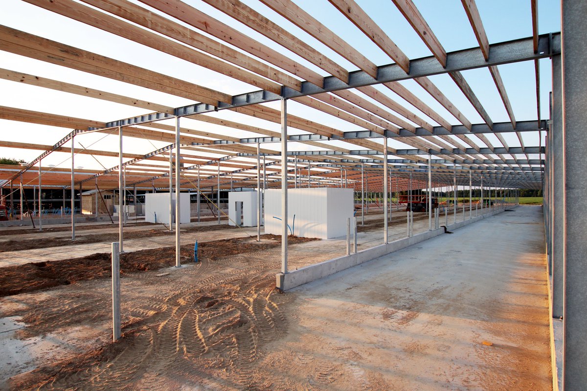 dairylanesystem's tweet photo. Tweet 1/2 - The DLS Structure is up, and wooden purlins are in progress at A.H.E. Dairy Farm! #DLSdairy #DLSrobotics #DLSstructure https://t.co/I5v1uLM2ij