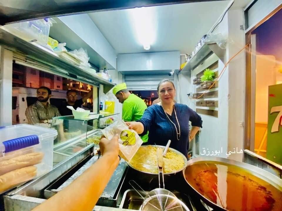WeAreNotNumbers's tweet photo. In another first in #Gaza, a simplified #Palestinian  traditional restaurant is managed by a #woman! It sells #Falafel, #Hummos, and more! Wouldn't you buy from her? https://t.co/ysWIpprSfs
