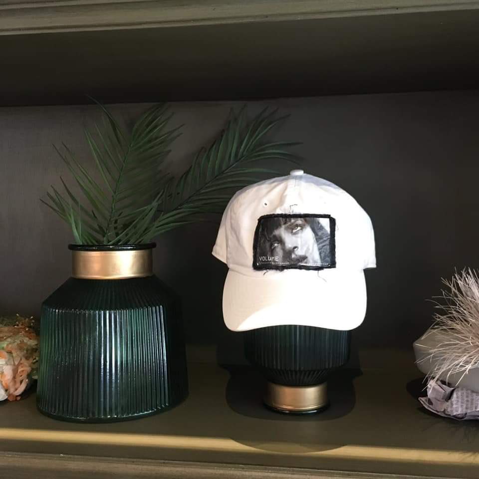 Jimin's parents displayed Jimin's cap he once wore in their new cafe
