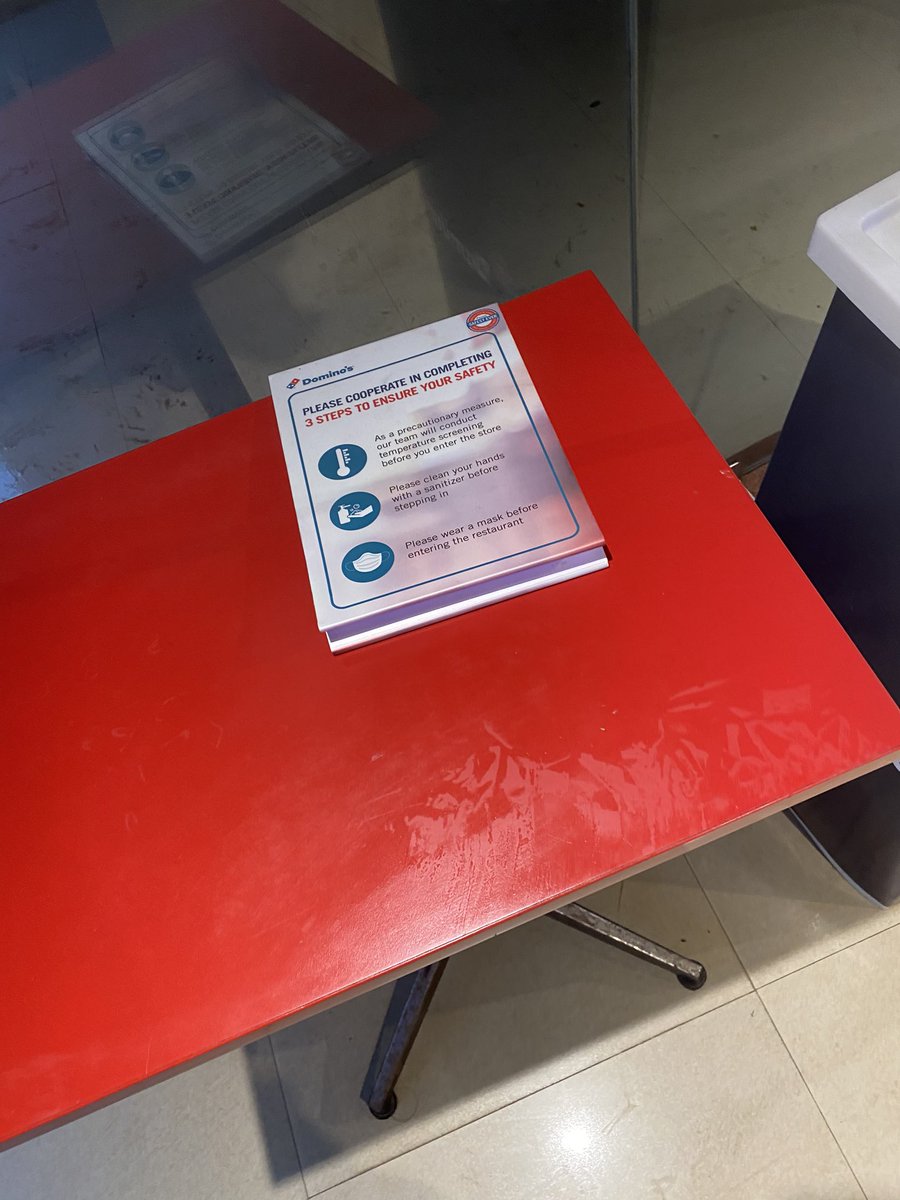 Event_Schemer's tweet image. This domino’s store in ranchi, jharkhand near sujata chowk, Has no person to check the temperature, there is not even a sanitizer at the door.
The staff is not wearing gloves and the  delivery guys are entring the kitchen. 
Is #dominos safe?
@dominos_india