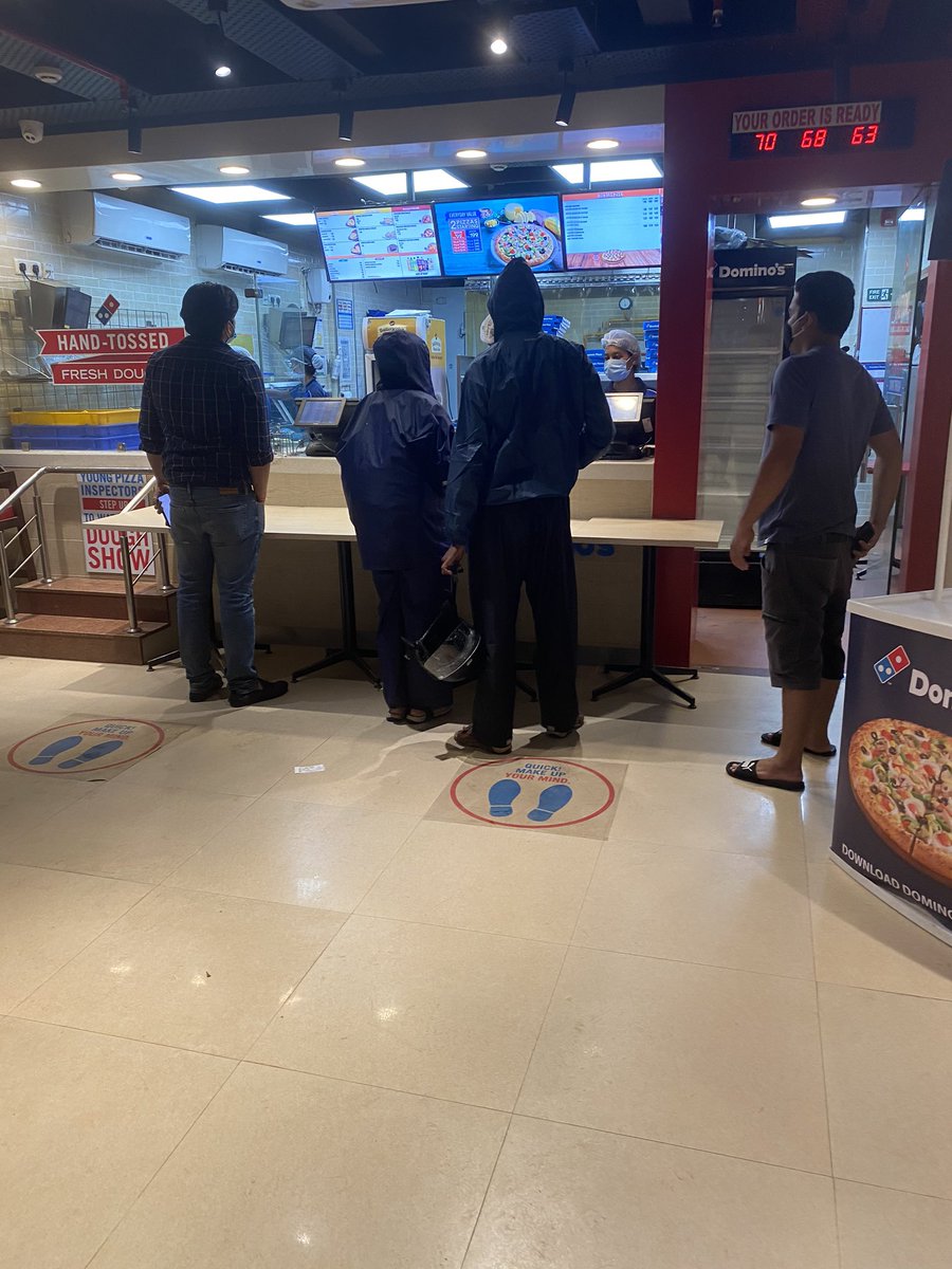 Event_Schemer's tweet image. This domino’s store in ranchi, jharkhand near sujata chowk, Has no person to check the temperature, there is not even a sanitizer at the door.
The staff is not wearing gloves and the  delivery guys are entring the kitchen. 
Is #dominos safe?
@dominos_india