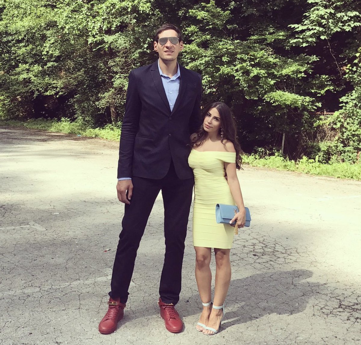 Darren Rovell on X: 7-foot-3 center Boban Marjanovic announces engagement  with awesome photo. Best part? She's definitely wearing heels.   / X