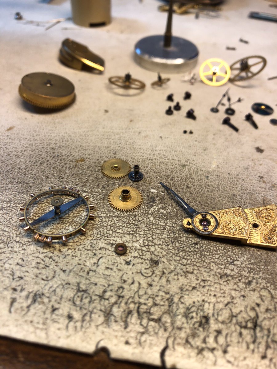 Timebuilder's tweet image. On the horrible messed up pocket watch, fit the lower balance jewel. Now it will go into the lathe to trim the thickness down for proper end shake. This watch is so old, the dial is held in place with small tapered pins rather than screws. 8 more hours it will be done.