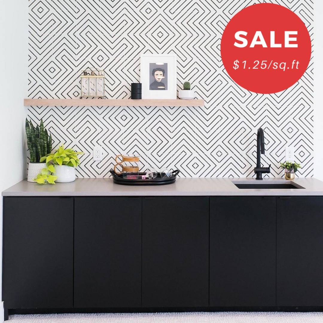 A contemporary kitchen with its own bar extension? Yes please! 🍷

Our tile of the week is this intricate 8x8" Kingston tile which has the perfect balance of black and white.