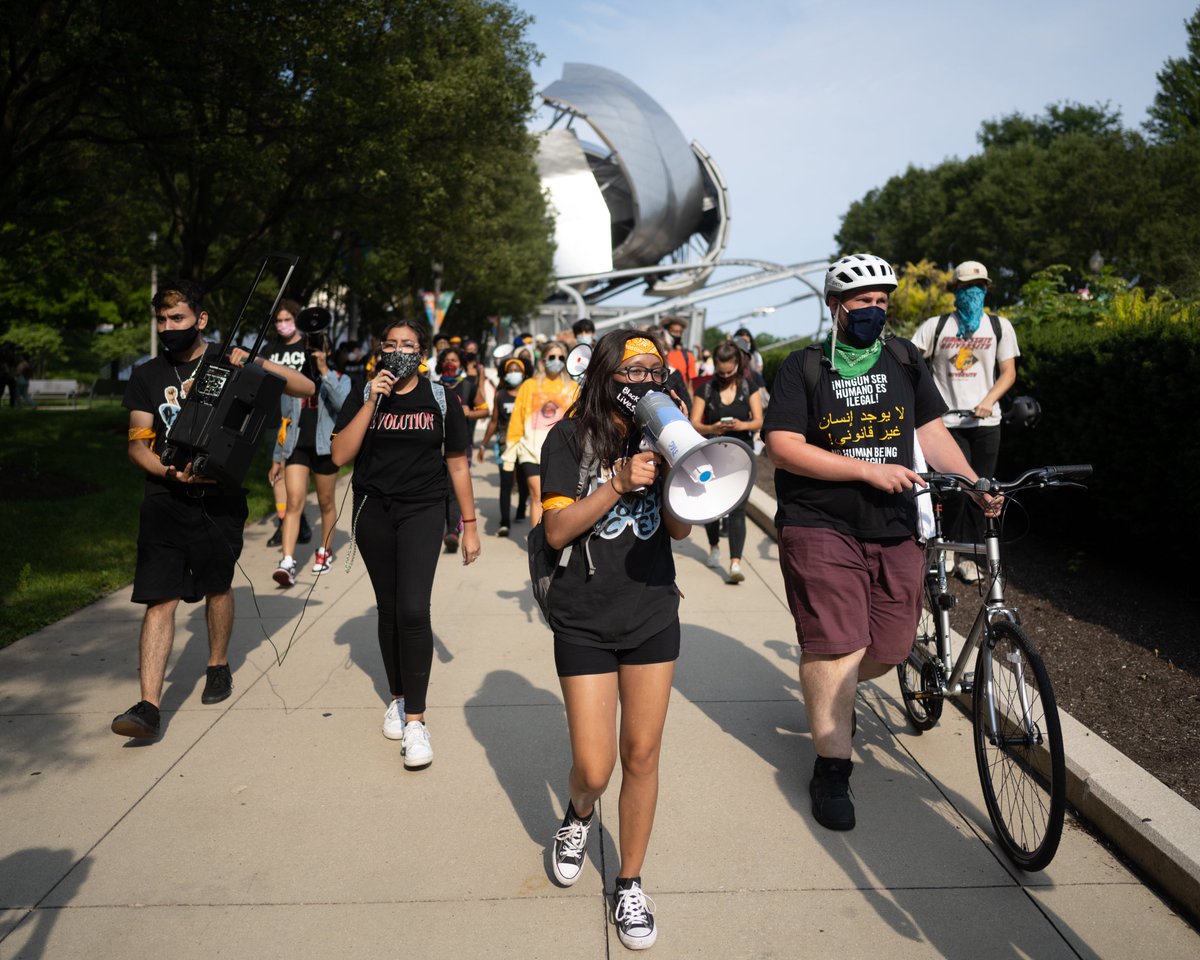 Protesters marched from the Bean to the intersection at Washington and Michigan, where organizers explained their demands and recounted how black and indigenous struggles have historically been intertwined.
