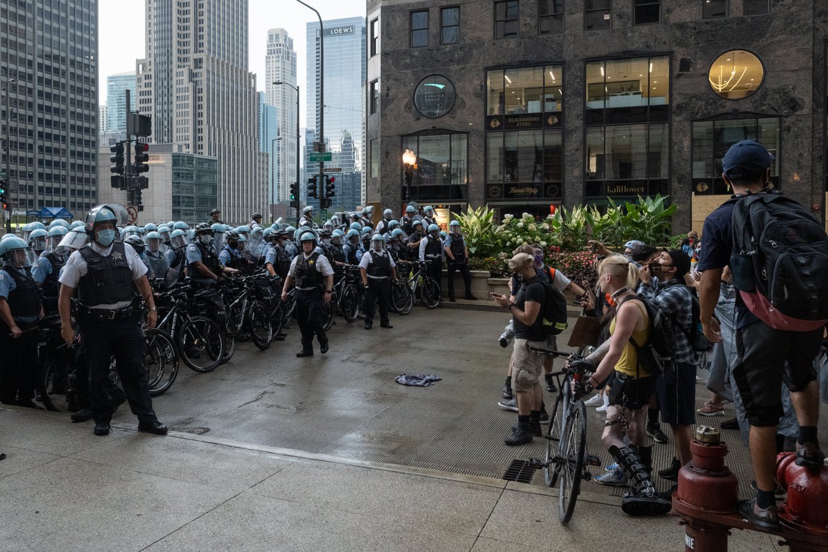 There were about 30 min between the time police ripped away the umbrellas until the organizers told everyone we were headed back south. Police pushed the group out of the intersection even though some people were still being treated for pepper spray.