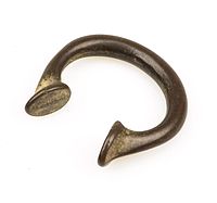 They are usually horseshoe-shaped, with terminations that face each other and are roughly lozenge-shaped.The earliest use of manillas was in West Africa, as a means of exchange they originated in Calabar and use across the Old Eastern part of Nigeria then spread across Africa.