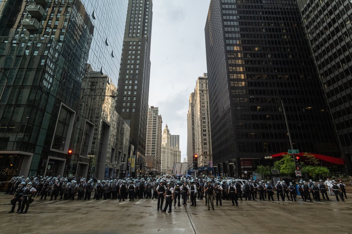 I count over 150 police officers in this photo.