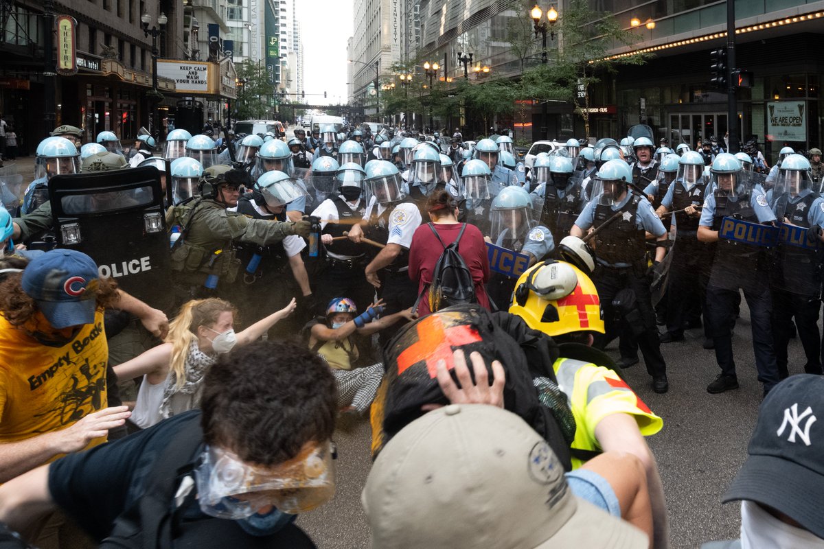 Police began grabbing bikes and spraying people again at Randolph and Dearborn. At least one medic was sprayed.