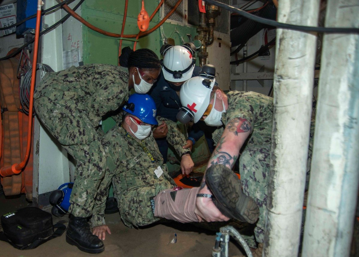 #Training Sailors assigned to the medical department aboard the Nimitz-class aircraft carrier USS George Washington (CVN 73) lift a mock patient during a medical casualty drill. (U.S. Navy photo by MCSA Preston Cash)