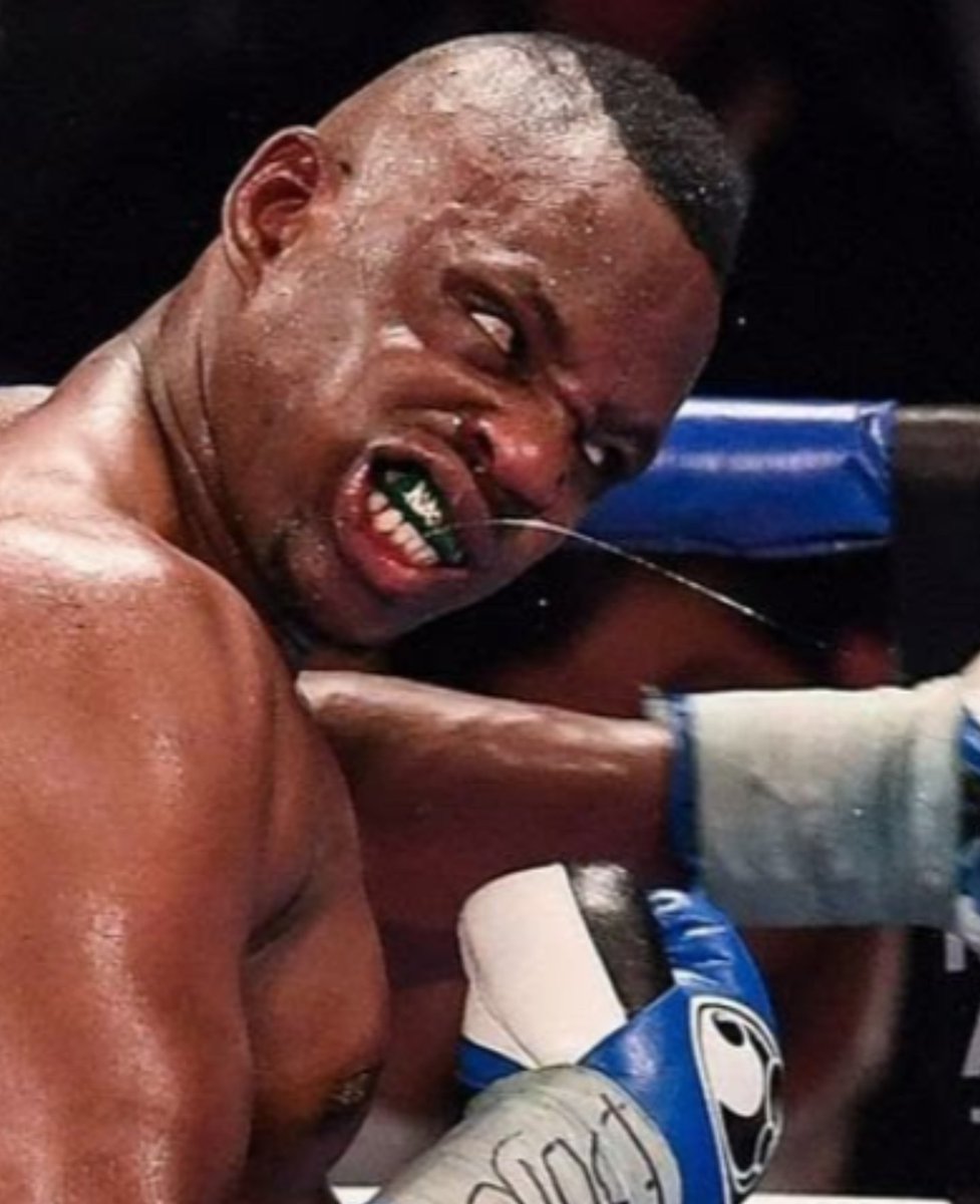 Dillian Whyte & a dog.