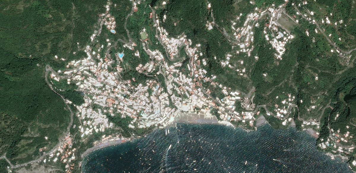 So it's would be anyone's dream to have a slow flypast of these seaside towns, carved into the cliff face.Let's see how the Amalfi coast looks when rendered by an algorithm from this (satellite of Positano).