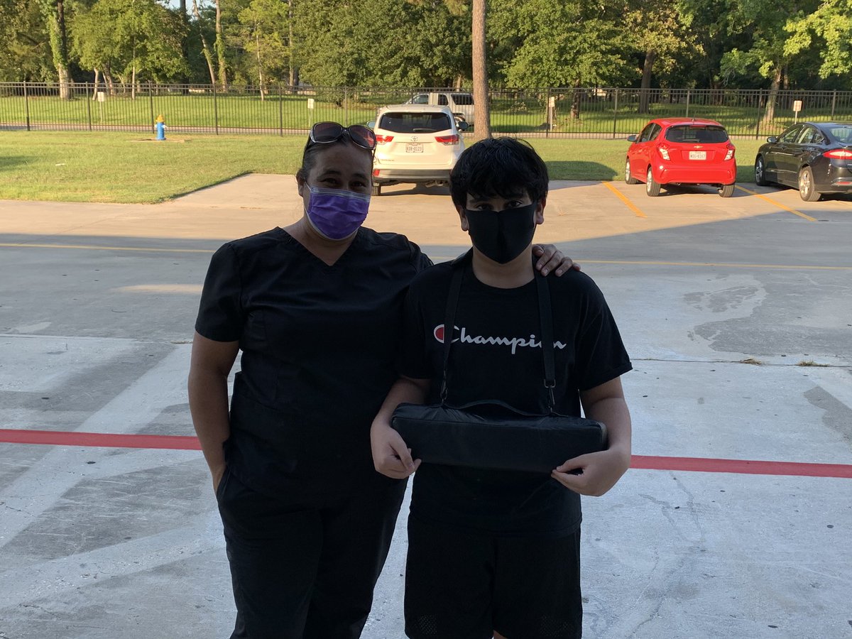 DueittMSBand's tweet photo. 7th and 8th grade instrument pick up just ended,   It was very successful.  Here is Luis and his Mom picking his up.  @Joerclark @DueittEagles #Thisishowwedueitt #FlyEaglesFly https://t.co/tHWnUXgSfH