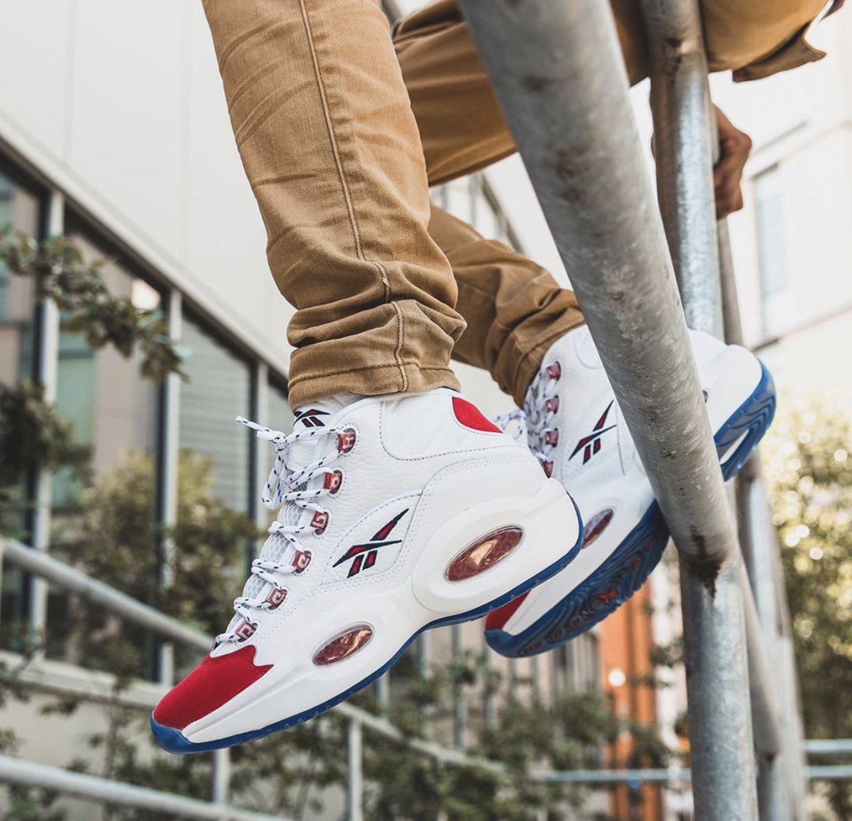 Reebok question mid sales red