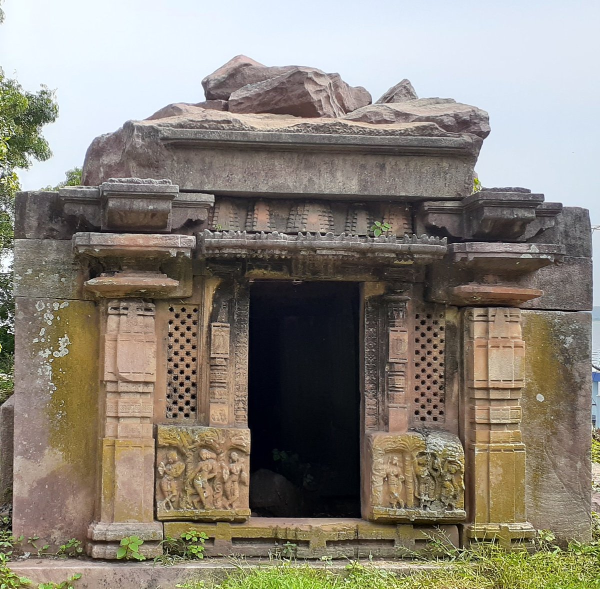 The third one, located in between the two temples, is the smallest of all. The dvara of the temple is carved similar to that of the adjacent temple except for the miniature superstructure models of shikara over the canopy of the door frame.5/5