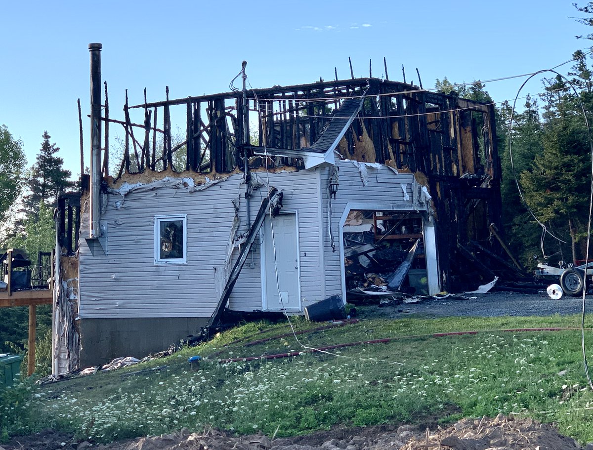 Family of four escapes fire by jumping off balcony. Photos from