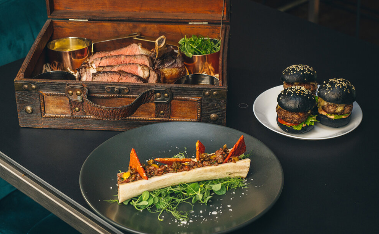 joshbythesea's tweet photo. there's a new restaurant in Chelsea where the cote de boeuf is served in a briefcase https://t.co/hEOosSOyYf