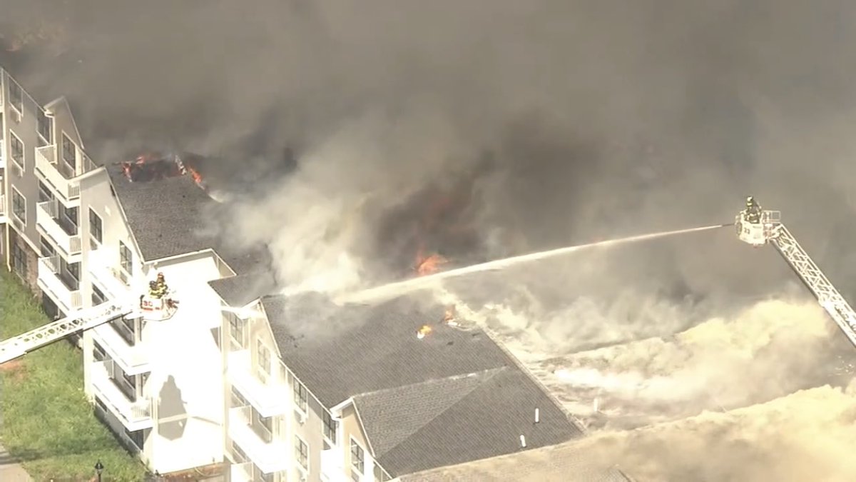 A three-alarm fire is raging at an apartment building under construction in #NewJersey via <a href="/ABC7NY/">Eyewitness News</a>
