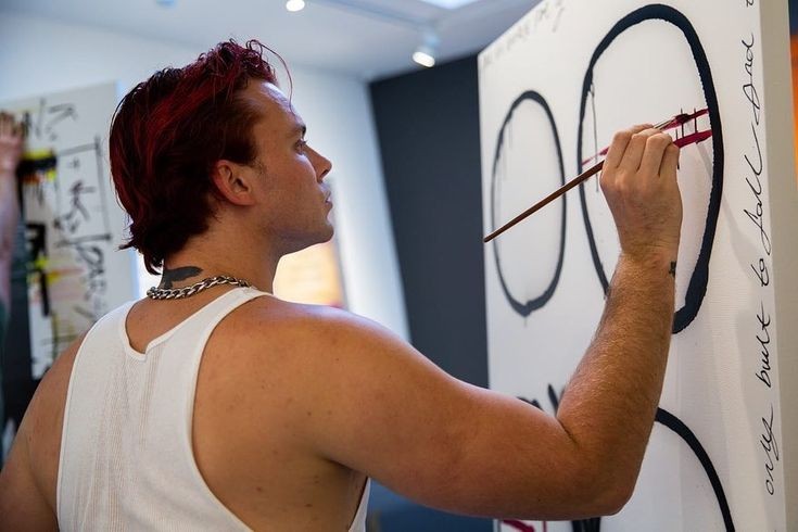 Ashton in a tanktopA thread