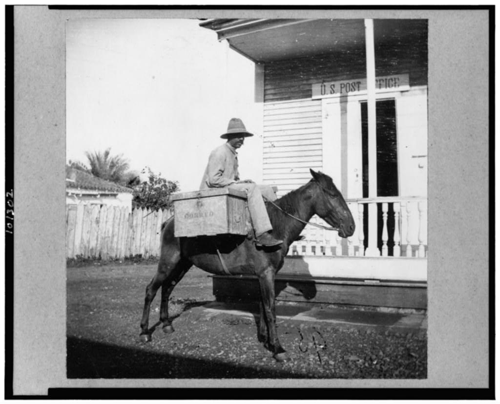 As our  @USPS remains under attack, a photography thread celebrating the people who process, sort, and deliver our mail. All images from  @librarycongress. Each tells a million stories. First, "Mail Carrier, Puerto Rico," ca. 1890-1923 (Frank and Frances Carpenter Collection).