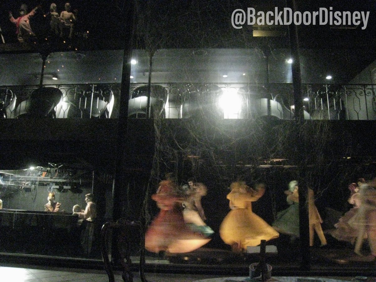 More photos of the Haunted Mansion Ballroom scene. These photos give a good look at how the peppers ghost effect is done