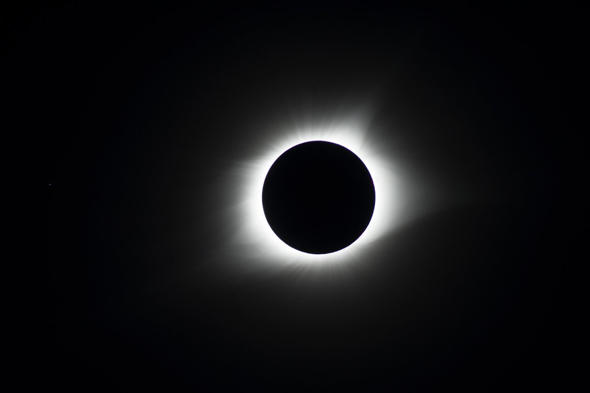 NASASun's tweet photo. Three years ago today, millions of people in the US saw the Sun in a new light during #Eclipse2017. During a total solar eclipse, the Moon blocks out the Sun’s bright face, allowing observers to see the Sun’s faint outer atmosphere, the corona. 🌎🌓☀️ https://t.co/sqJjLiUnZv https://t.co/pwVUGrrlwr