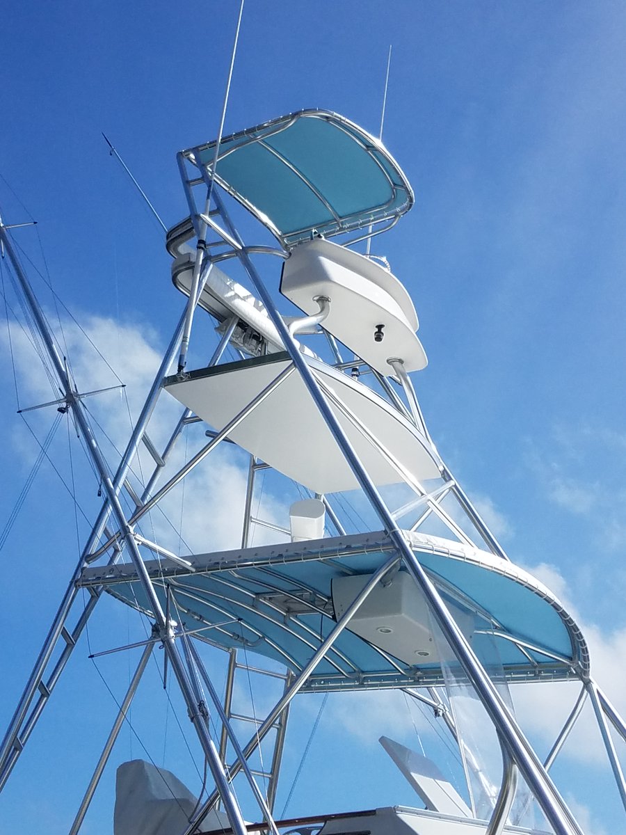 T - Top Recover in Sky Blue #Sunbrella for a 2006 Twin-Vee. It was a windy day so the install was a bit challenging but of course, we got you covered! #BWC #PompanoBeach
