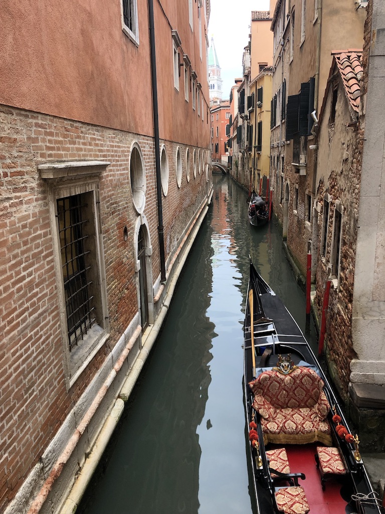 6. VeniceVenice is often talked about and once we learned some of the history we knew we had to goHere was the view pulling into Venice from our water taxiAnd another shot of the famous canals[cont...]