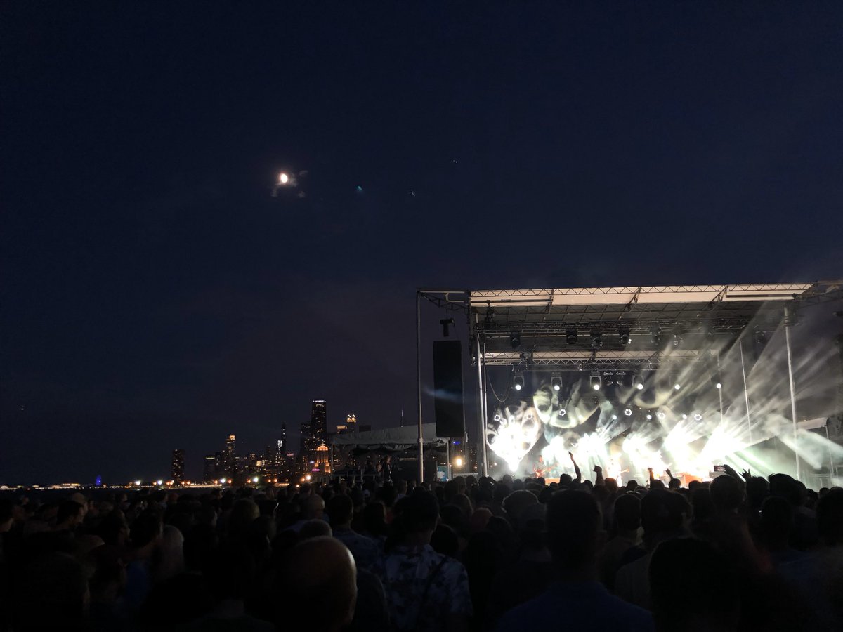 Out of downtown and heading north along the lakeshore path we have The Lakefront Green, venue #29. Only one show here for me and for most of us,  @umphreysmcgee. It was a beautiful night with friends and music and beverages, with the most scenic backdrop of the Chicago skyline. &ndash; bei  The Rocks at Fullerton Beach