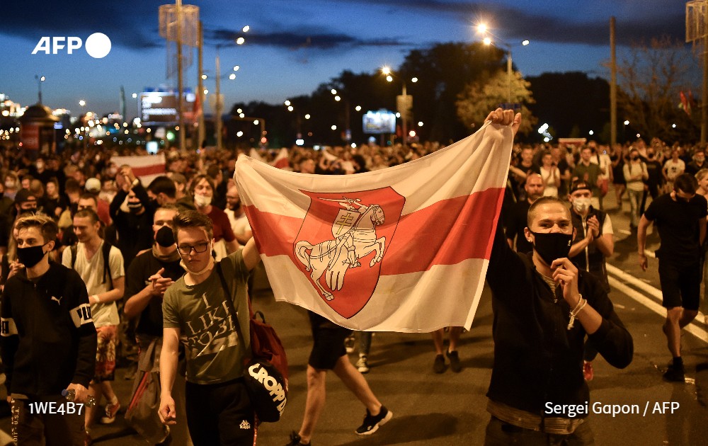 AFP's tweet photo. Demonstrators and riot police face off in Minsk after polls closed in Belarus's presidential election https://t.co/ONnMFYPKJC
