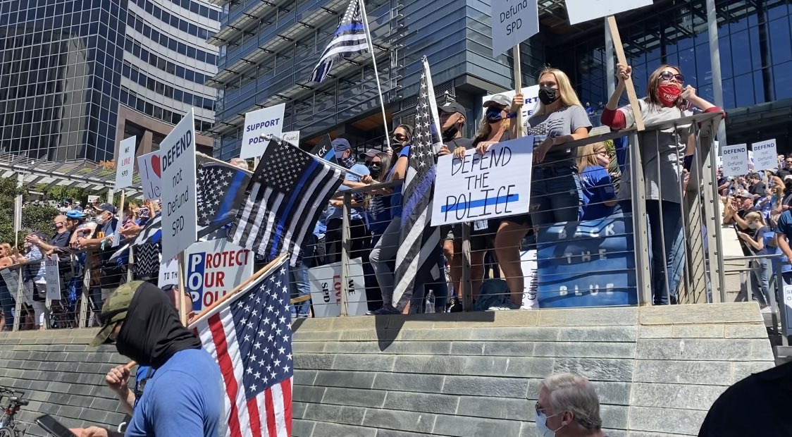 KatieDaviscourt's tweet photo. What I gathered from today’s Defend @SeattlePD rally:

—Seattle has a strong silent majority

—Defunding the Police is an un popular opinion

—Republicans and Democrats are both in support of Public Safety

—Seattle City Council is caving to mob mentality &amp; not the sane majority https://t.co/IwyGD583nt