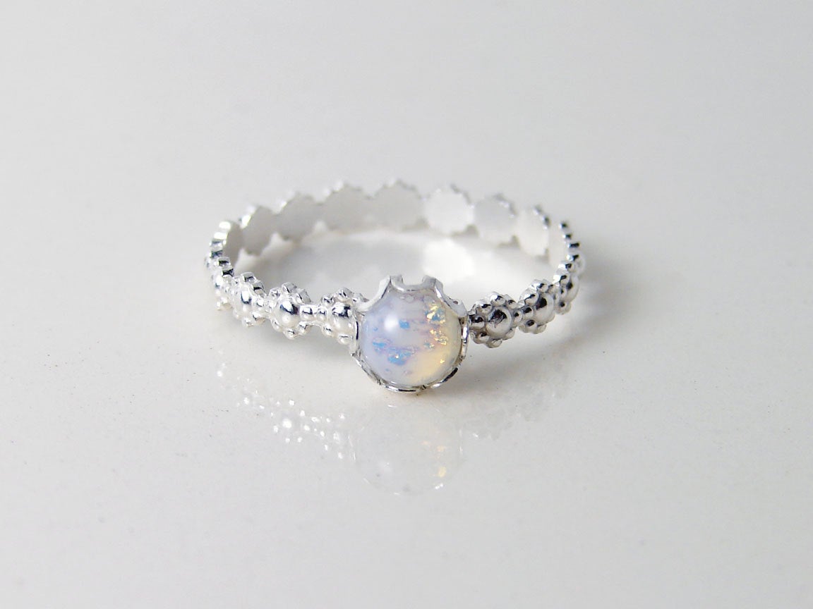 JewelryByMikako's tweet photo. Vintage Opal Rhinestone Ring. White Opal Glass Stone on a Daisy RIng. Made to Order. Stacking Ring. October Birthday https://t.co/z5sr4uUG0A #HandmadeRings #BirthdayGift #GiftIdea #GiftforHer #Etsy #OpalRing #FreeShipping #DaintyJewelry #Jewelry #DelicateRing https://t.co/wMZL9S6IM6
