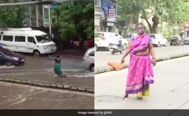 ndtv's tweet photo. Meet Mumbai Woman Who Stood 7 Hours Near Manhole Amid Rain To Save People https://t.co/4qbYKBh3h4 https://t.co/dgLOWjjhSW
