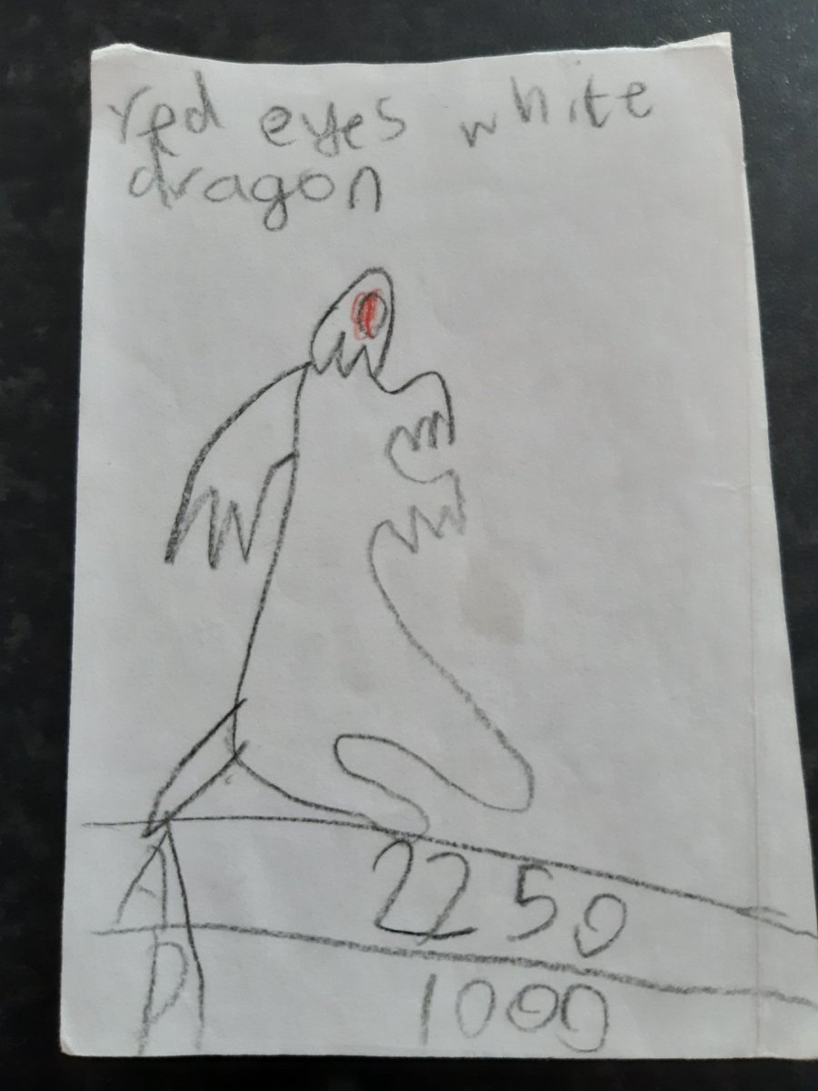 Day 3: After making 3 blues eyes white dragons, child me decided he had effectively mastered the art of drawing blue eyes white dragon. Red eyes black dragon seemed to hard to draw (and too much colouring) so I made an original card. Presenting "Red eyes white dragon".