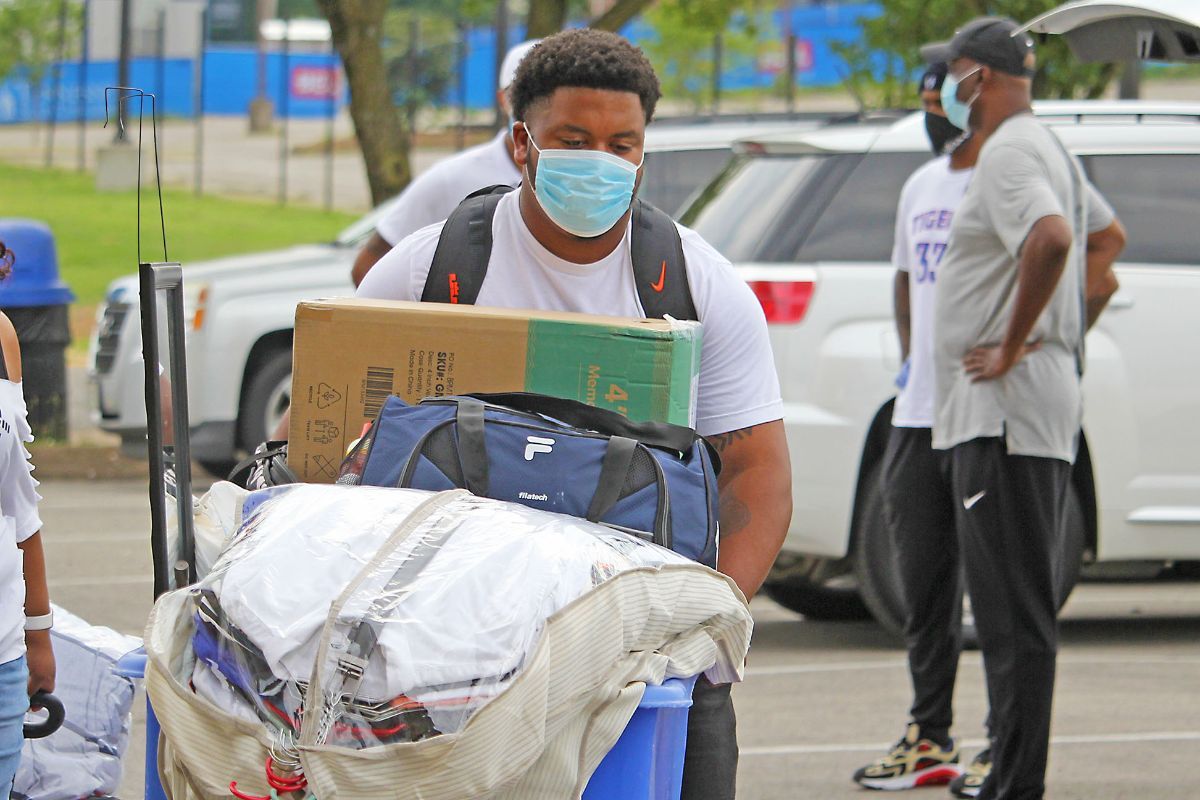 TSUTigersTrack's tweet photo. You can still see the smiles under the masks. 
📦 Happy to be moved in. 
#BigBlueRising https://t.co/5tJlqKSwag