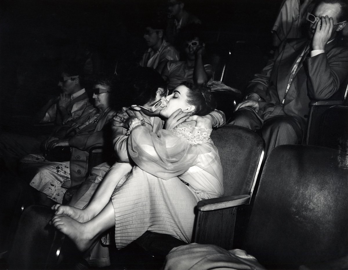 Lovers with 3D Glasses at the Palace Theater, 1943 by Weegee