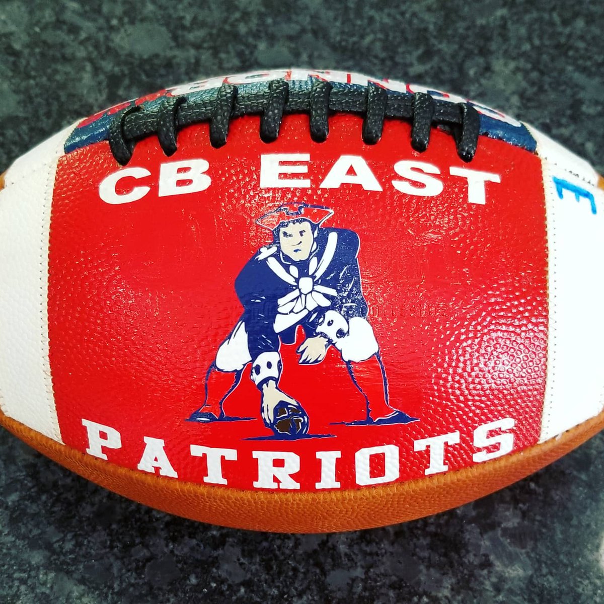 The_Ball_Girl's tweet photo. CB East's @CBEastFootball QB - CONNOR BOYLE continues to kick cancers butt giving him the ultimate nickname of "The Iron Patriot" - he was recently presented with this special custom football 🏈 from his coaches and team. You are truly an inspiration Connor! @east_cb https://t.co/cCyPzVbpGy