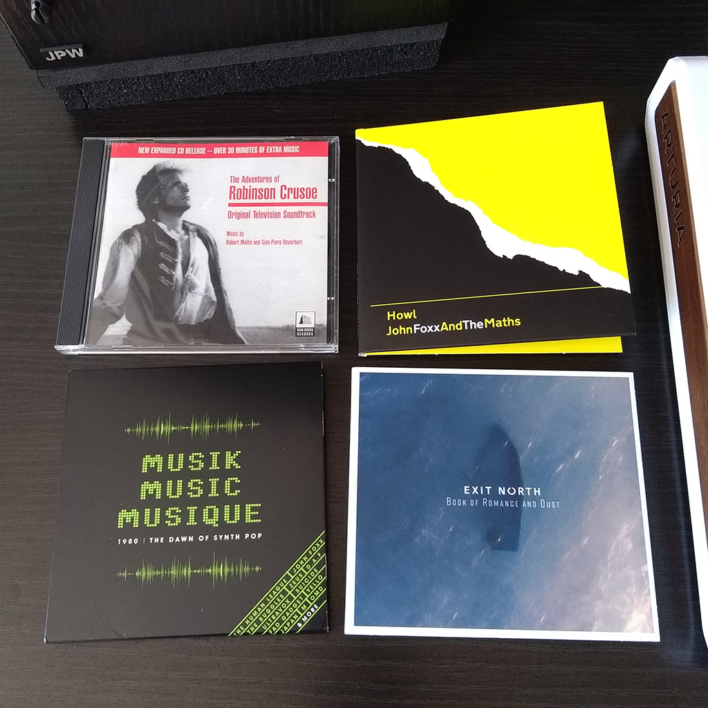 KevinTaggerty's tweet image. A few of the albums I have been listening to recently; 'Howl' by John Foxx and The Maths @foxxmetamedia also 'Book of Romance and Dust' by Exit North @istevejansen and a new compilation from @CherryRedGroup Musik Music Musique - 1980: The Dawn of Synth Pop #lockdownlistening