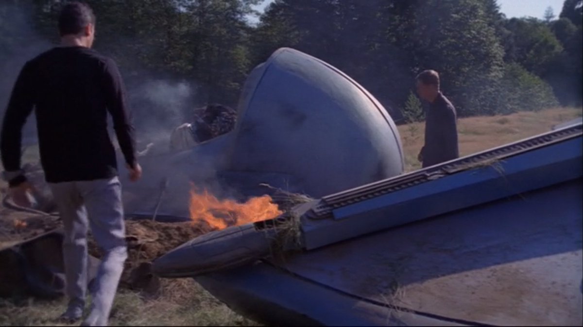 We start the episode on a very short cold open. Two Goa'uld motherships are blow out of the sky and a death glider crashes. We don't know this is Tollana. But we absolutely recognize who is in the cockpit asking for help. Is he free of the goa'uld?