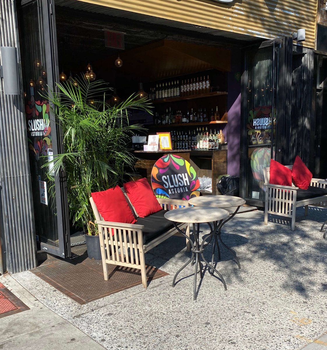 SlushAstoria's tweet photo. Outside is OPEN! Who’s coming to #SlushAstoria this eve for a custom-blended slushee? We’ve got Ronald and Gustov behind the bar ready to blend you summer in a cup! ##30thAvenueAstoria #Astoria See our menu at https://t.co/jmSiTJnG1o https://t.co/pbkDamwi1y