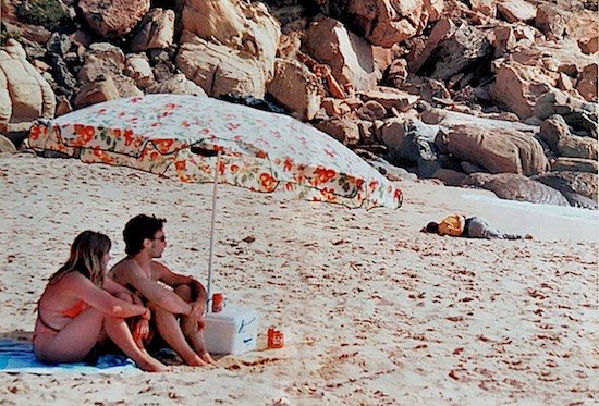 Lowkey0nline's tweet photo. Picture taken by Javier Bauluz on beach in Tarifa, Spain, September 2000. The dead body of this drowned man (identity unknown), attempting to enter Europe, lay on the beach for hours as people indifferently continued their day out. https://t.co/fPEoYhHLI6