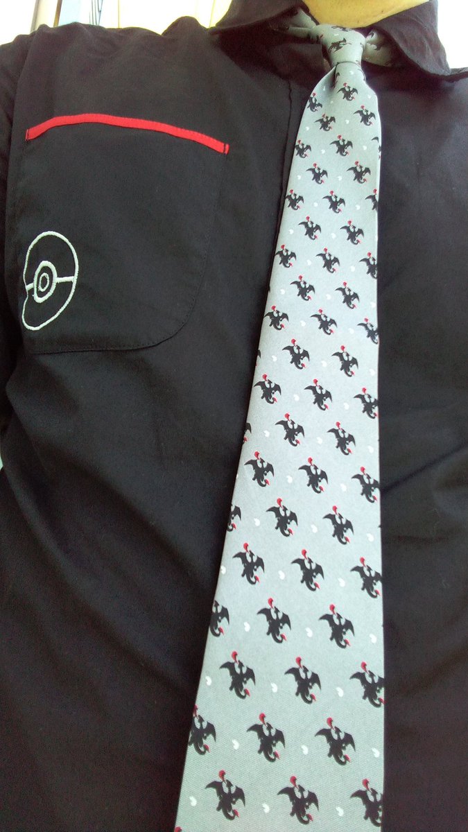 TNCNat's tweet photo. On Mondays I like to dress in my finest Pokegear and give a Pack to the first person to say "cool Charizard tie!" #pokemon #tcg #ptcgo #PokemonGO #TNComics https://t.co/kfvUlsqjgx